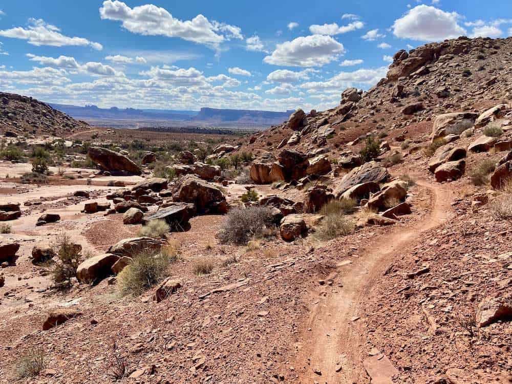 Red dirt singletrack mountain bike trail in Moab, Utah