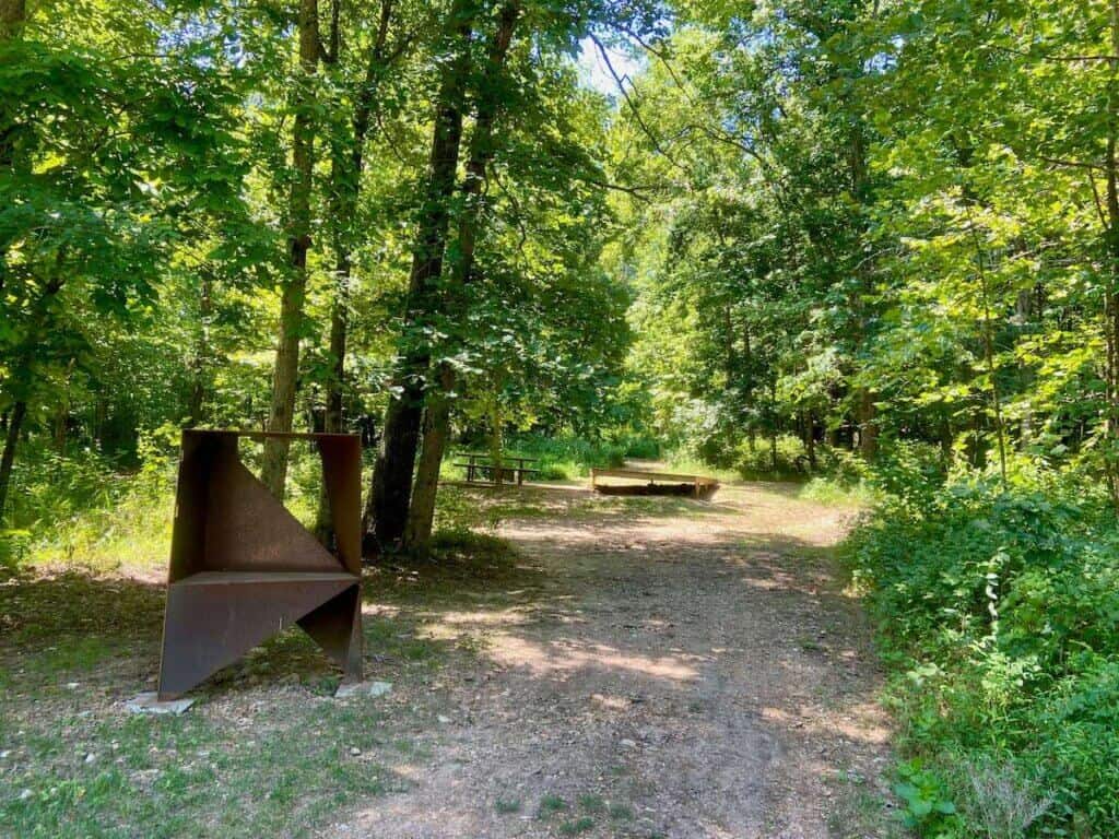 Walk in campsite at Coler Campground with elevated wooden tent platform