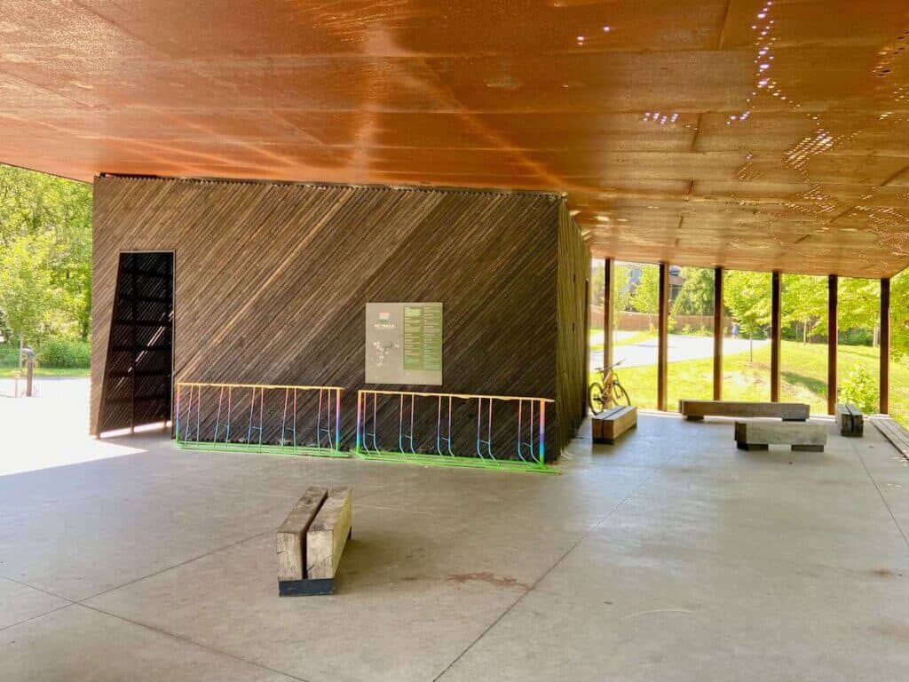 Modern wood paneled restrooms and outdoor space at Coler Mountain Bike Preserve in Bentonville Arkansas